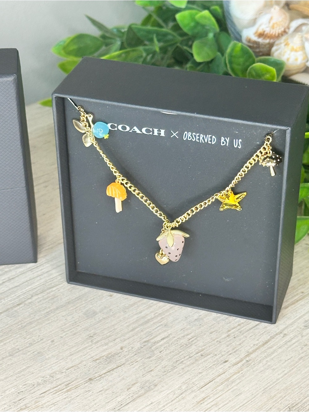 Coach Gold-Tone Charm Necklace with Mushroom Star - Picture 3 of 7